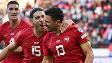 Serbia's defender Milos Veljkovic (R) celebrates with Serbia's defender #15 Srdjan Babic (C) after scoring the first goal for his team during the UEFA Champions League Qualifying Group G football match between Serbia and Bulgaria at Gradski Dubocica stadium in Leskovac, Serbia on November 19, 2023. (Photo by ANDREJ ISAKOVIC / AFP)