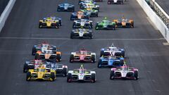 May 26, 2024; Indianapolis, Indiana, USA; Indycar Series drivers Scott McLaughlin (3), Sting Ray Robb (41) and Conor Daly (24) race three wide for the lead during the 108th running of the Indianapolis 500 at Indianapolis Motor Speedway. Mandatory Credit: Mark J. Rebilas-USA TODAY Sports