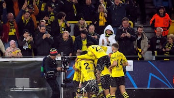 Soccer Football - Champions League - Round of 16 - Second Leg - Borussia Dortmund v PSV Eindhoven - Signal Iduna Park, Dortmund, Germany - March 13, 2024 Borussia Dortmund's Marco Reus celebrates scoring their second goal with teammates REUTERS/Thilo Schmuelgen