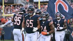 CHICAGO, ILLINOIS - SEPTEMBER 10: Khalil Herbert #24 of the Chicago Bears reacts after scoring a two point conversion against the Green Bay Packers during the second half at Soldier Field on September 10, 2023 in Chicago, Illinois.