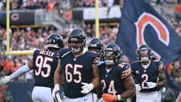 CHICAGO, ILLINOIS - SEPTEMBER 10: Khalil Herbert #24 of the Chicago Bears reacts after scoring a two point conversion against the Green Bay Packers during the second half at Soldier Field on September 10, 2023 in Chicago, Illinois.   Quinn Harris/Getty Images/AFP (Photo by Quinn Harris / GETTY IMAGES NORTH AMERICA / Getty Images via AFP)