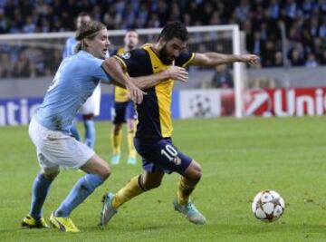 Arda Turan con Markus Halsti.