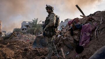 FILE PHOTO: An Israeli soldier operates in the Gaza Strip amid the ongoing conflict between Israel and the Palestinian Islamist group Hamas, in this handout picture released on December 21, 2023. Israel Defense Forces/Handout via REUTERS    THIS IMAGE HAS BEEN SUPPLIED BY A THIRD PARTY/File Photo