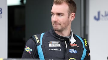 DAYTONA BEACH, FLORIDA - FEBRUARY 15: Cody Ware, driver of the #51 Nurtec ODT Ford, walks the garage area during practice for the NASCAR Cup Series 64th Annual Daytona 500 at Daytona International Speedway on February 15, 2022 in Daytona Beach, Florida.   James Gilbert/Getty Images/AFP
== FOR NEWSPAPERS, INTERNET, TELCOS & TELEVISION USE ONLY ==