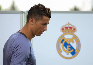 Madrid's Cristiano Ronaldo arrives at a television set after a training session during open media day.