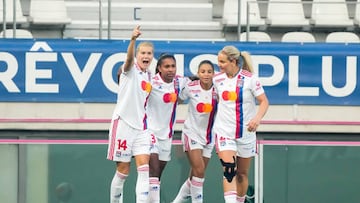 Catarina MACARIO of Olympique Lyonnais (OL) celebrate his goal with Ada HEGERBERG of Olympique Lyonnais (OL), Lindsey HORAN of Olympique Lyonnais (OL) and Delphine CASCARINO of Olympique Lyonnais (OL) during the D1 Arkema match between Paris Saint Germain and Lyon at Parc des Princes on May 29, 2022 in Paris, France. (Photo by Hugo Pfeiffer/Icon Sport via Getty Images)