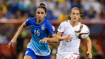 MONTREAL, QC - JUNE 13: Rafaelle #16 of Brazil and Alexia Putellas #21 of Spain chase the ball during the 2015 FIFA Women's World Cup Group E match at Olympic Stadium on June 13, 2015 in Montreal, Quebec, Canada. Minas Panagiotakis/Getty Images/AFP
== FOR NEWSPAPERS, INTERNET, TELCOS & TELEVISION USE ONLY ==