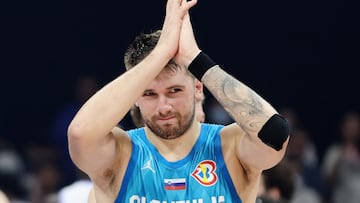 Basketball - FIBA World Cup 2023 - Classification Games 7-8 - Italy v Slovenia - Mall of Asia Arena, Manila, Philippines - September 9, 2023 Slovenia's Luka Doncic applauds fans after the match REUTERS/Eloisa Lopez