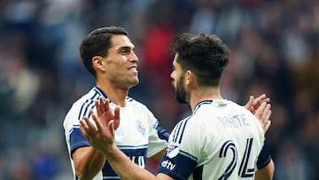 VANCOUVER, BRITISH COLUMBIA - MARCH 02: (L-R) Daniel Rios #14 of the Vancouver Whitecaps FC celebrates with teammate Brian White #24 after winning the MLS match between Vancouver Whitecaps FC and LA Galaxy at BC Place Stadium on March 02, 2025 in Vancouver, British Columbia. Rich Lam/Getty Images/AFP (Photo by Rich Lam / GETTY IMAGES NORTH AMERICA / Getty Images via AFP)