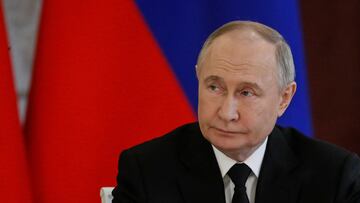 Russian President Vladimir Putin attends a sign docs ceremony during his meeting with King of Bahrain, Hamad bin Isa Al Khalifa at the Kremlin in Moscow, Russia, 23 May 2024. King Hamad bin Isa Al Khalifa of Bahrain is on an official visit to Russia. YURI KOCHETKOV/Pool via REUTERS