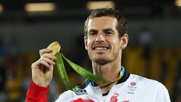 Andy Murray of Great Britain poses with his Gold medal.