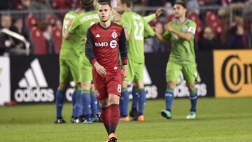 Toronto FC midfielder Ager Aketxe (8) walks away as the Seattle Sounders celebrate a goal during the second half of an MLS soccer match Wednesday, May 9, 2018, in Toronto. (Frank Gunn/The Canadian Press via AP)