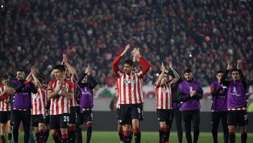 Argentina's Estudiantes de La Plata players celebrate after defeating Brazil's Fortaleza during the Copa Libertadores football tournament round of sixteen second leg match at the Jorge Luis Hirschi stadium in La Plata, Argentina, on July 7, 2022. (Photo by JUAN MABROMATA / AFP)