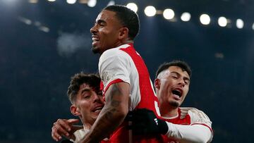 Arsenal's German midfielder #29 Kai Havertz (L) celebrates scoring his team's first goal with Arsenal's Brazilian striker #09 Gabriel Jesus (C) during the UEFA Champions League Group B football match between Arsenal and RC Lens at the Arsenal Stadium in north London on November 29, 2023. (Photo by Ian Kington / AFP)