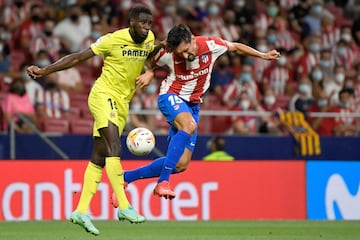 Villarreal's Senegalese forward Boulaye Dia (L) vies with Atletico Madrid's Montenegrin defender Stefan Savic during the Spanish League football match between Club Atletico de Madrid and Villarreal CF at the Wanda Metropolitano stadium in Madrid on August 29, 2021. (Photo by PIERRE-PHILIPPE MARCOU / AFP)