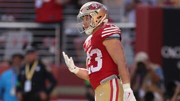 Christian McCaffrey #23 of the San Francisco 49ers celebrates scoring his fourth touchdown