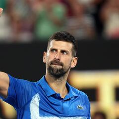 Serbia's Novak Djokovic celebrates victory over Spain's Carlos Alcaraz after their men's singles quarterfinal match on day ten of the Australian Open tennis tournament in Melbourne on January 22, 2025. (Photo by Martin KEEP / AFP) / -- IMAGE RESTRICTED TO EDITORIAL USE - STRICTLY NO COMMERCIAL USE --