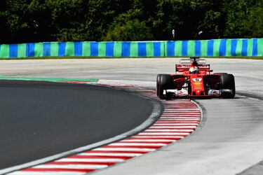 Sebastian Vettel on pole as Ferrari lock down front row