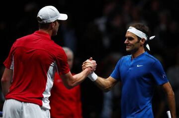 Roger Federer shakes hands with Sam Querrey on Day 2 of the Laver Cup in Prague.