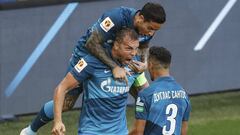 Zenit&#039;s Artem Dzyuba, center, celebrates with teammates after scoring the opening goal during the Russian Super Cup final soccer match between Zenit St. Petersburg and Locomotiv Moscow at CSKA Arena in Moscow, Russia, Friday, Aug. 7, 2020. (Alexander