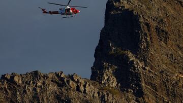 A rescue helicopter searches for a young British man who disappeared in the Masca ravine, on the island of Tenerife, Spain, June 20, 2024. REUTERS/Borja Suarez