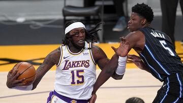 Mar 28, 2021; Los Angeles, California, USA; Los Angeles Lakers center Montrezl Harrell (15) drives to the basket as he is defended by Orlando Magic center Mo Bamba (5) in the first half of the game at Staples Center. Mandatory Credit: Jayne Kamin-Oncea-USA TODAY Sports