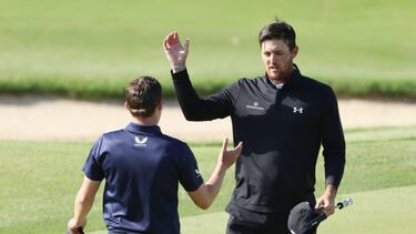 TULSA, OKLAHOMA - MAY 22: Mito Pereira of Chile hugs Matt Fitzpatrick of England as they finish their round on the 18th green during the final round of the 2022 PGA Championship at Southern Hills Country Club on May 22, 2022 in Tulsa, Oklahoma. (Photo by Christian Petersen/Getty Images)