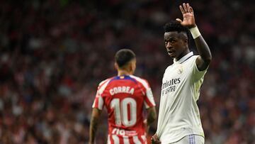 Real Madrid's Brazilian forward Vinicius Junior waves during the Spanish League football match between Club Atletico de Madrid and Real Madrid CF at the Wanda Metropolitano stadium in Madrid on September 18, 2022. (Photo by OSCAR DEL POZO / AFP)