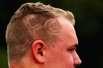Fans who let their football passion level go to their heads... literally