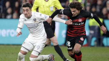 Leeds United&#039;s Pablo Hernandez, left, gets past Western Sydney Wanderers&#039; Fabian Monge during their friendly soccer match in Sydney, Australia, Saturday, July 20, 2019. (AP Photo/Rick Rycroft)