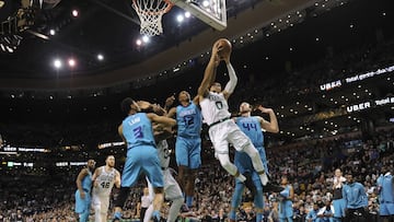 Nov 10, 2017; Boston, MA, USA; Boston Celtics forward Jayson Tatum (0) is fouled by Charlotte Hornets center Dwight Howard (12) while driving to the basket during the second half at TD Garden. Mandatory Credit: Bob DeChiara-USA TODAY Sports