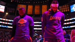 LOS ANGELES, CALIFORNIA - MAY 20: LeBron James #6 of the Los Angeles Lakers and Anthony Davis #3 of the Los Angeles Lakers stand for the national anthem before playing against the Denver Nuggets in game three of the Western Conference Finals at Crypto.com Arena on May 20, 2023 in Los Angeles, California. NOTE TO USER: User expressly acknowledges and agrees that, by downloading and or using this photograph, User is consenting to the terms and conditions of the Getty Images License Agreement.   Harry How/Getty Images/AFP (Photo by Harry How / GETTY IMAGES NORTH AMERICA / Getty Images via AFP)