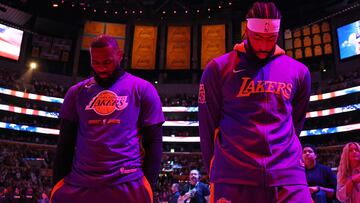 LOS ANGELES, CALIFORNIA - MAY 20: LeBron James #6 of the Los Angeles Lakers and Anthony Davis #3 of the Los Angeles Lakers stand for the national anthem before playing against the Denver Nuggets in game three of the Western Conference Finals at Crypto.com Arena on May 20, 2023 in Los Angeles, California. NOTE TO USER: User expressly acknowledges and agrees that, by downloading and or using this photograph, User is consenting to the terms and conditions of the Getty Images License Agreement.   Harry How/Getty Images/AFP (Photo by Harry How / GETTY IMAGES NORTH AMERICA / Getty Images via AFP)