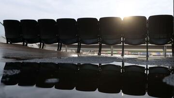 MARTINSVILLE, VIRGINIA - APRIL 10: A detail view of empty seats and a reflection on a puddle of water prior to the NASCAR Cup Series Blue-Emu Maximum Pain Relief 500 at Martinsville Speedway on April 10, 2021 in Martinsville, Virginia. James Gilbert/Get