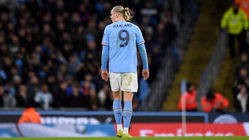 Manchester City's Norwegian striker Erling Haaland walks on the pitch during the English FA Cup fourth round football match between Manchester City and Arsenal at the Etihad Stadium in Manchester, northwest England, on January 27, 2023. (Photo by Oli SCARFF / AFP) / RESTRICTED TO EDITORIAL USE. No use with unauthorized audio, video, data, fixture lists, club/league logos or 'live' services. Online in-match use limited to 120 images. An additional 40 images may be used in extra time. No video emulation. Social media in-match use limited to 120 images. An additional 40 images may be used in extra time. No use in betting publications, games or single club/league/player publications. / 