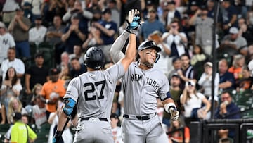 BALTIMORE, MARYLAND - SEPTEMBER 20: Aaron Judge #99 of the New York Yankees celebrates with Giancarlo Stanton #27 after hitting a home run in the third inning against the Baltimore Orioles at Oriole Park at Camden Yards on September 20, 2025 in Baltimore, Maryland. Greg Fiume/Getty Images/AFP (Photo by Greg Fiume / GETTY IMAGES NORTH AMERICA / Getty Images via AFP)