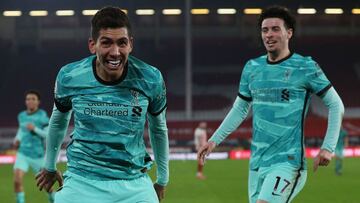 Liverpool's Brazilian midfielder Roberto Firmino celebrates scoring his team's second goal during the English Premier League football match between Sheffield United and Liverpool at Bramall Lane in Sheffield, northern England on February 28, 202