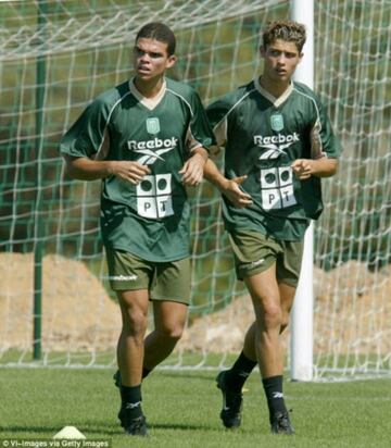 Pepe pictured alongside Cristiano while on trial at Sporting