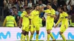 Villarreal's Nigerian midfielder Samuel Chukwueze (L) celebrates scoring his team's third goal during the Spanish league football match between Real Madrid CF and Villarreal CF at the Santiago Bernabeu stadium in Madrid on April 8, 2023. (Photo by Pierre-Philippe MARCOU / AFP)