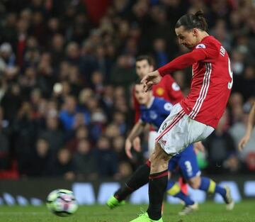 Zlatan Ibrahimovic of Manchester United scores their first goal during the Premier League match between Manchester United and Everton at Old Trafford