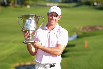 Rory McIlroy celebrates with the trophy after the final round of the Wells Fargo Championship.
