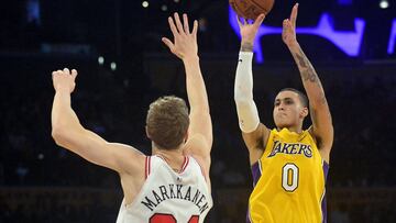 November 21, 2017; Los Angeles, CA, USA; Los Angeles Lakers forward Kyle Kuzma (0) shoots against Chicago Bulls forward Lauri Markkanen (24) during the second half at Staples Center. Mandatory Credit: Gary A. Vasquez-USA TODAY Sports