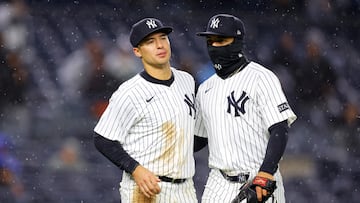 NEW YORK, NEW YORK - APRIL 11: Anthony Volpe #11 and Oswald Peraza #18 of the New York Yankees celebrate after turning a double play in the fourth inning against the San Francisco Giants at Yankee Stadium on April 11, 2025 in New York City. Mike Stobe/Getty Images/AFP (Photo by Mike Stobe / GETTY IMAGES NORTH AMERICA / Getty Images via AFP)