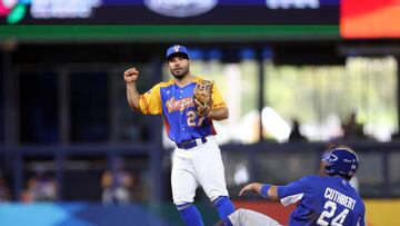 MIAMI, FL - MARCH 14: Chesler Cuthbert #24 or Team Nicaragua is out at second base as José Altuve #27 of Team Venezuela turns a double play in the first inning of Game 7 of Pool D between Team Nicaragua and Team Venezuela at loanDepot Park on Tuesday, March 14, 2023 in Miami, Florida. (Photo by Rob Tringali/WBCI/MLB Photos via Getty Images)