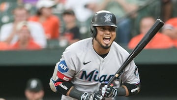 Jul 14, 2023; Baltimore, Maryland, USA; Miami Marlins second baseman Luis Arraez (3) reacts after taking a pouch during the first inning of the game against the Baltimore Orioles  at Oriole Park at Camden Yards. Mandatory Credit: Tommy Gilligan-USA TODAY Sports