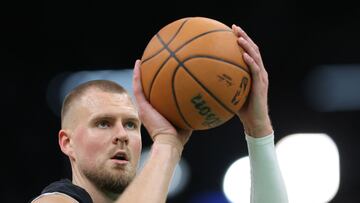 BOSTON, MASSACHUSETTS - JUNE 17: Kristaps Porzingis #8 of the Boston Celtics warms up before Game Five of the 2024 NBA Finals against the Dallas Mavericksat TD Garden on June 17, 2024 in Boston, Massachusetts. NOTE TO USER: User expressly acknowledges and agrees that, by downloading and or using this photograph, User is consenting to the terms and conditions of the Getty Images License Agreement.   Adam Glanzman/Getty Images/AFP (Photo by Adam Glanzman / GETTY IMAGES NORTH AMERICA / Getty Images via AFP)