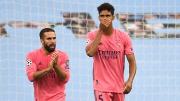 Rapha&euml;l Varane reacts after Raheem Sterling scored the opener. 