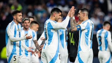 PHILADELPHIA, PENNSYLVANIA - MARCH 22: �ngel Di Maria #11 of Argentina celebrates the goal by Cristian Romero #16 of Argentina during the first half of the International Friendly match against El Salvador at Lincoln Financial Field on March 22, 2024 in Philadelphia, Pennsylvania.   Ira L. Black/Getty Images/AFP (Photo by Ira L. Black / GETTY IMAGES NORTH AMERICA / Getty Images via AFP)
