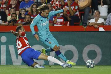 Antoine Griezmann and Víctor Díaz.