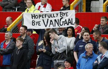 Man Utd fans protest against current manager Louis van Gaal.